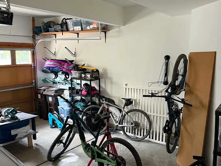 Garage storage is included with the rental. Photo includes my current tenant's belongings, so there would be more space for a new tenant.