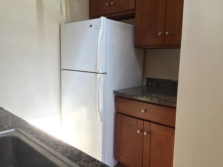 Skylight in kitchen brings in beautiful, natural light.
*Refrigerator has been upgraded to a new one, not the one in photo.