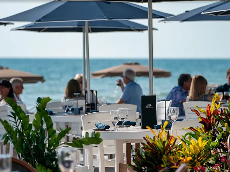 5 minute walk directly down the street to the premier ocean front beach dining (on the sand) at The Turtle Club Restaurant - be sure to make reservations ahead! (image courtesy of The Turtle Club)
