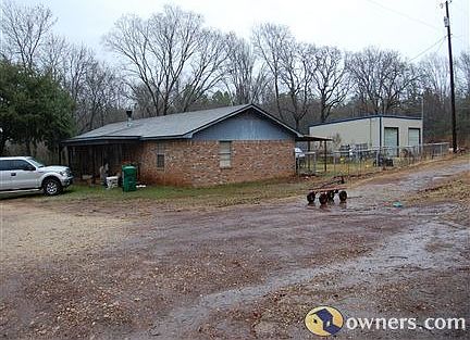 house and 2 bay shop 1 acre