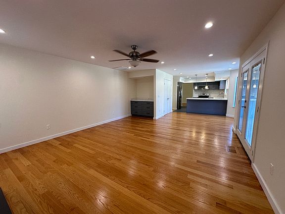 Beautiful hardwood throughout this home! This is the living room with fireplace!