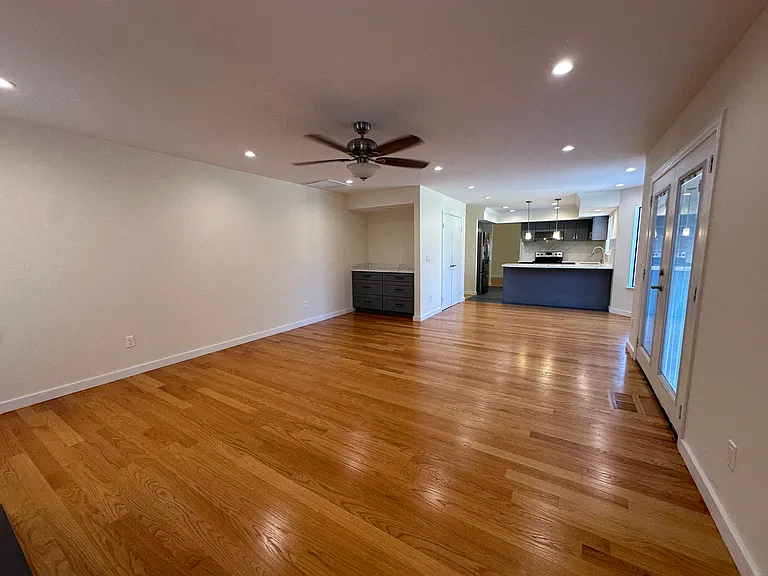 Beautiful hardwood throughout this home! This is the living room with fireplace!