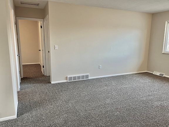 Hallway to 2 main level bedrooms
