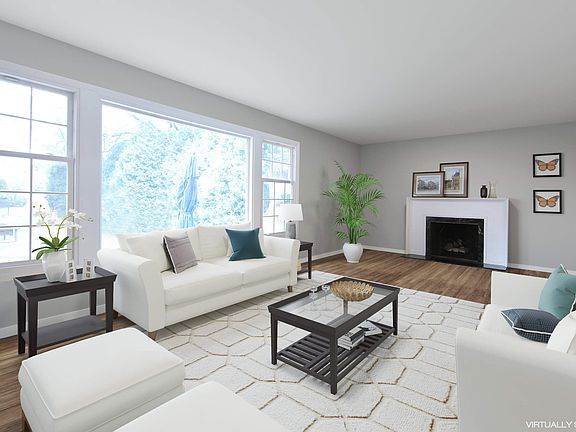 Formal living room with gas fireplace