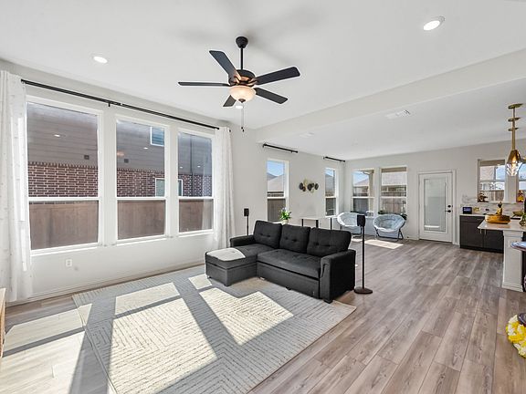 The furniture is not included with the home, as shown in the picture.