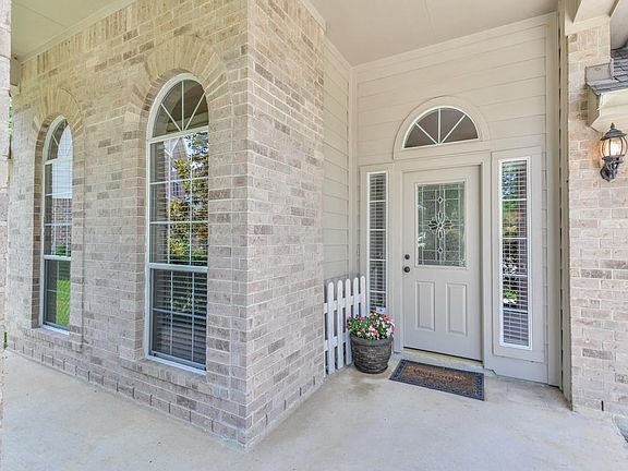 What a pretty covered front porch.