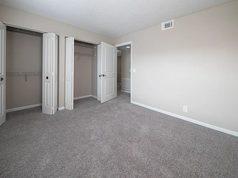 Double the delight in The Pacific Starsavor the luxury of an oversized bedroom with dual expansive closets, each adorned with meticulously crafted built-in shelving for wonderous wardrobe organization.