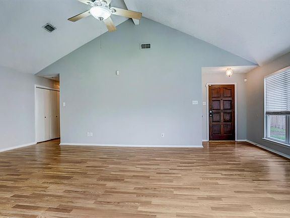 This great living area has easy access to secondary bedroom and laundry space. Natural lighting makes this area shine!