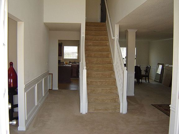 Foyer w/ Stairs to upper level