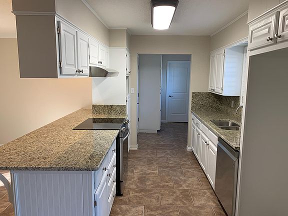 New granite tops include breakfast bar.