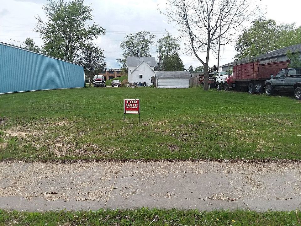 Includes small white shed.