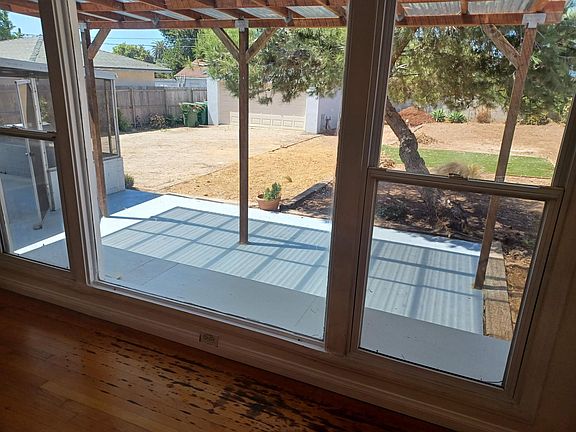 Spacious Yard w 2 Car, 50 Amp service, Garage and turn around