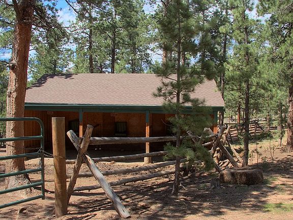 Large enclosure around barn