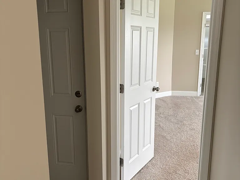 Entry to downstairs Primary bedroom