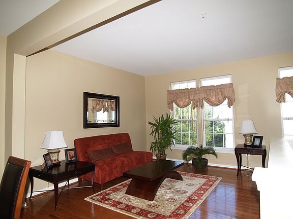 Hardwood floors throughout main level and entryway