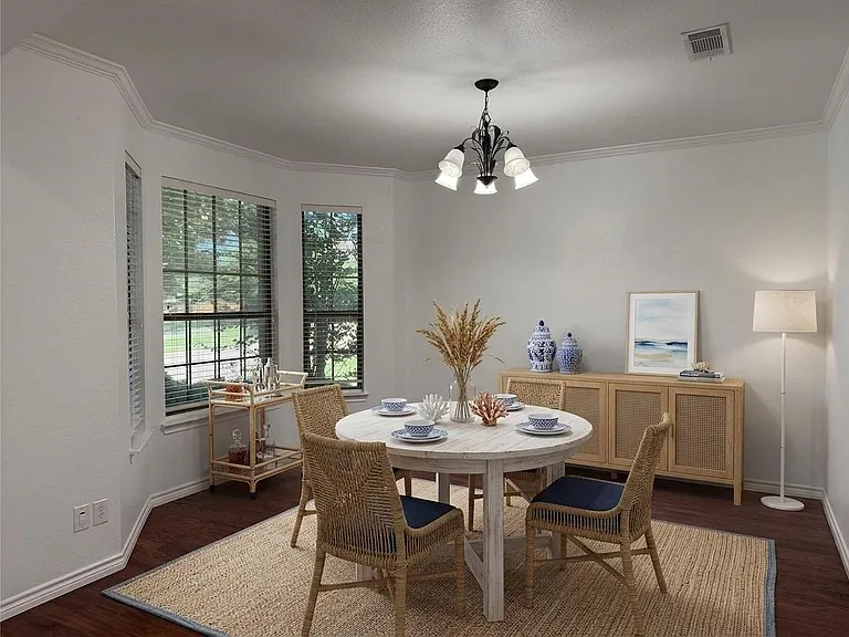 Virtually Staged. This front room would make a great dining room.