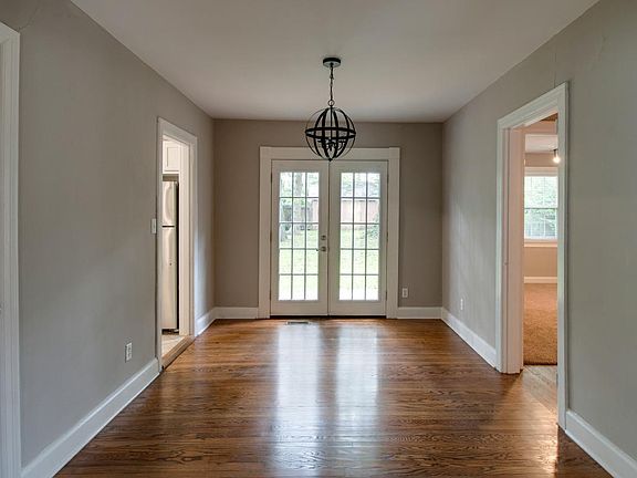 Dining room opens to back patio and fenced backyard