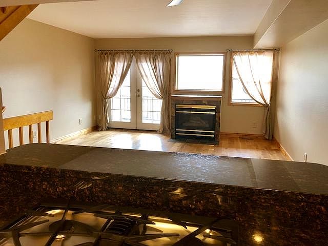 Kitchen looking into living room