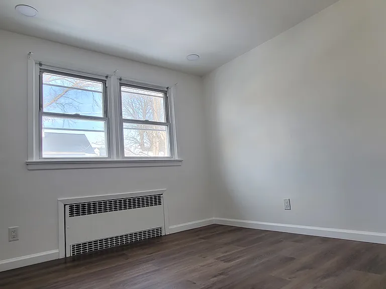 Bedroom #2 (10x10) with matching slat accent wall