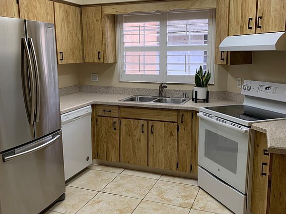 Eat-in-kitchen with skylight. Fridge w/ice maker 2 yrs. old. DW new. Range self-cleaning. one yr. old
