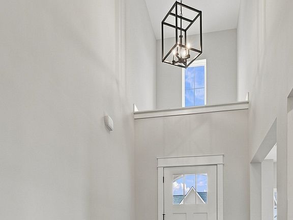Immediate design and lighting to light up the living space and hallway as soon as you enter through