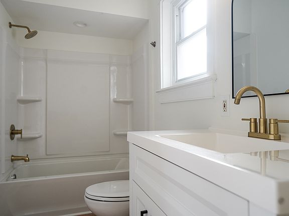 New, never-used shower and vanity.