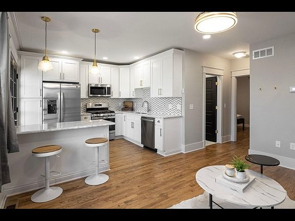 2nd image of 229-235 W 4th St #229