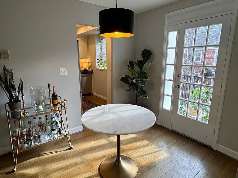 Dining area with access to private balcony