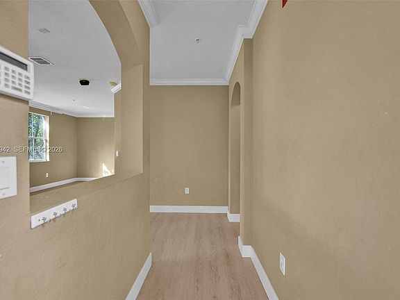 5th image of 100 Jacaranda Country Club Dr APT 203