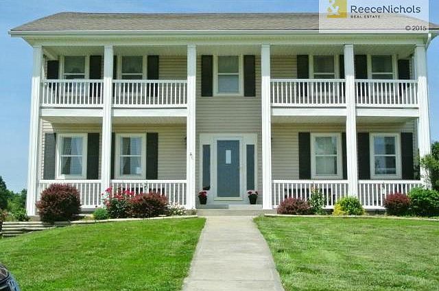 Stately home on 3.1 acres featuring 4 covered porches in Peculia