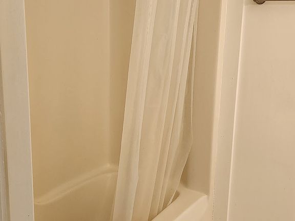 Bathroom with full shower/tub combo