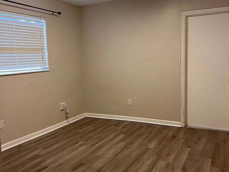 Master Bedroom with access to 2nd room. Can be used as an office, TV room, exercise room.. you decide.