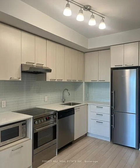 310 Tweedsmuir Ave #201 — Photo 14