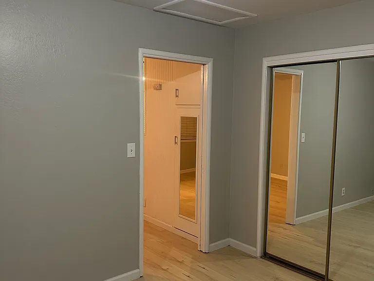 Bedroom with view towards living room