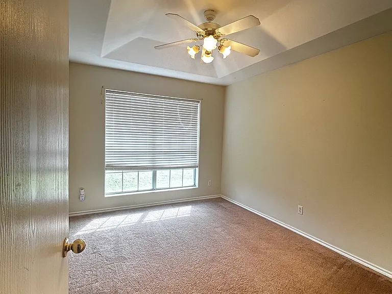 3rd bedroom facing front of house.
