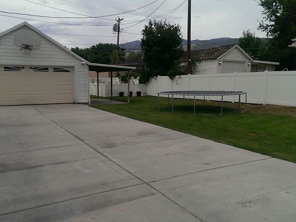 Garage & Driveway w/ Side Yard