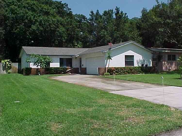 Lovely landscaped with spacious driveway