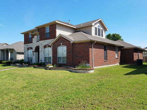 front of the house from one corner