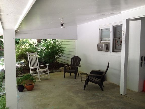 Side carport area for sitting / dining