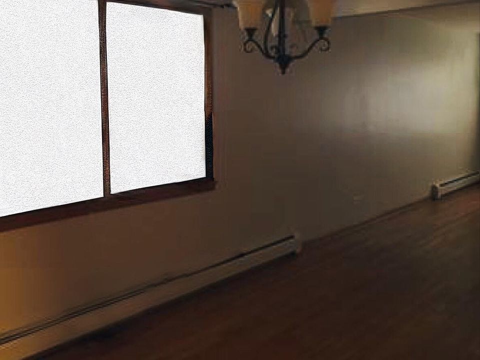 Dining room which extends into living room area.