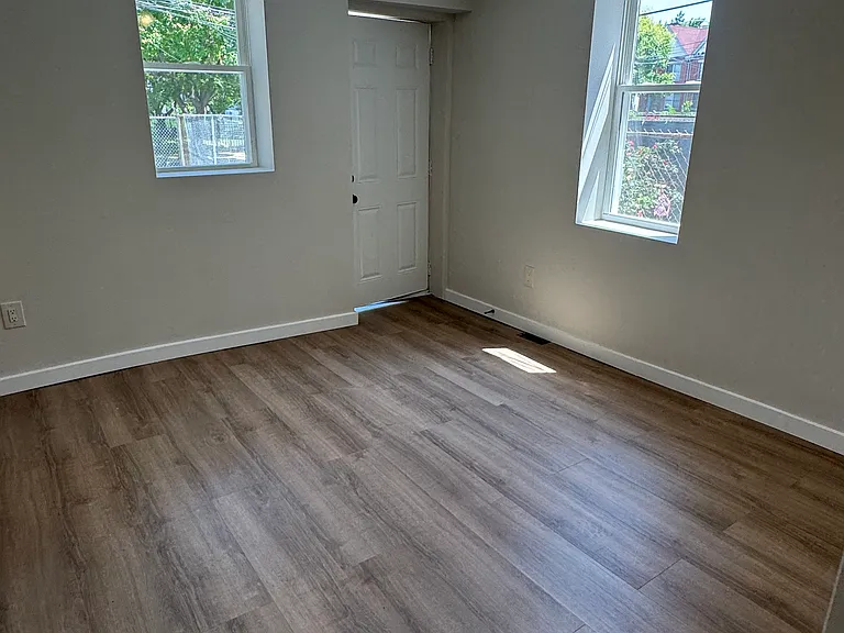 main bedroom with access to the rear yard