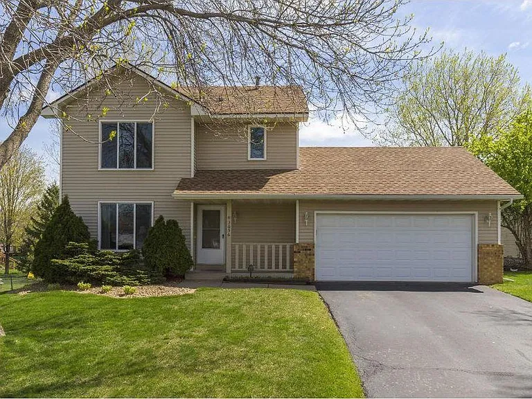 Home front view with attached 2 Car garage (Two storey building)