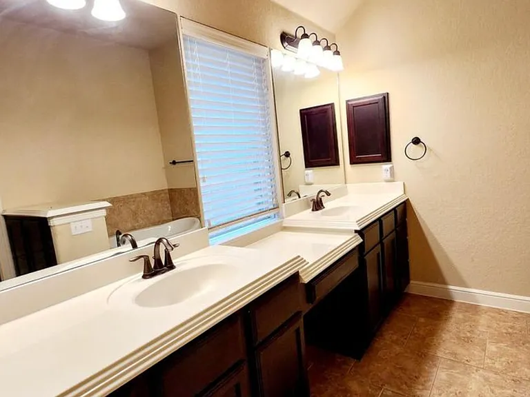 Your master bathroom, double vanity and for the lady of the home a makeup station