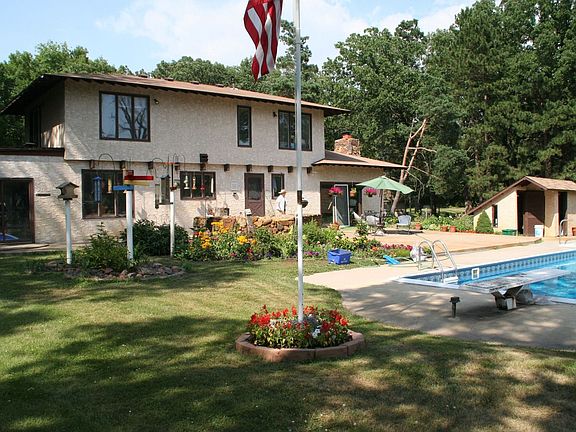 House, flowers, birdfeeders