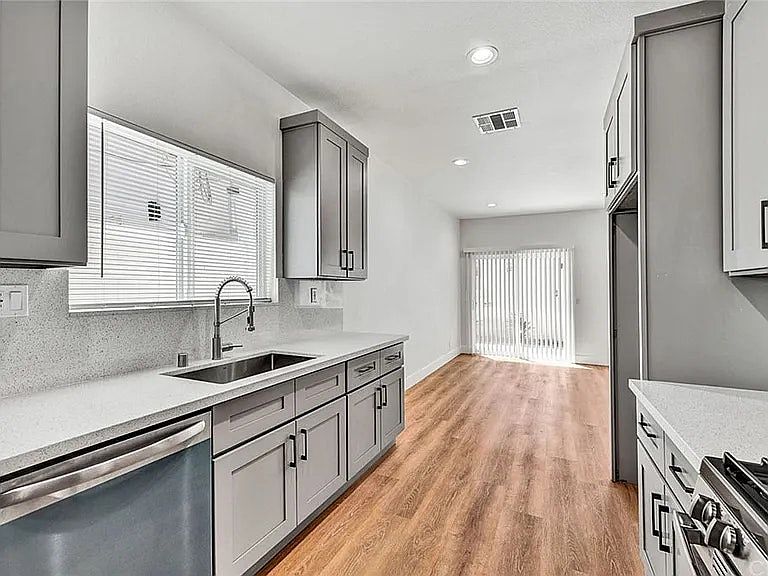 Kitchen looking into living room