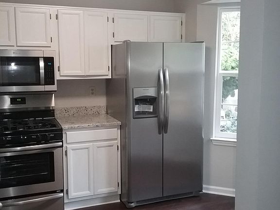 All new stainless steel appliances in kitchen as well as gra