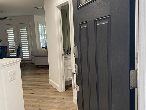 Entry and powder room at the right