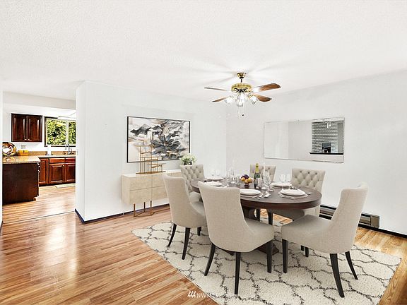 Virtually staged to highlight formal dining room!