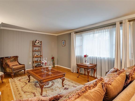 Family room with gleaming hardwood floors