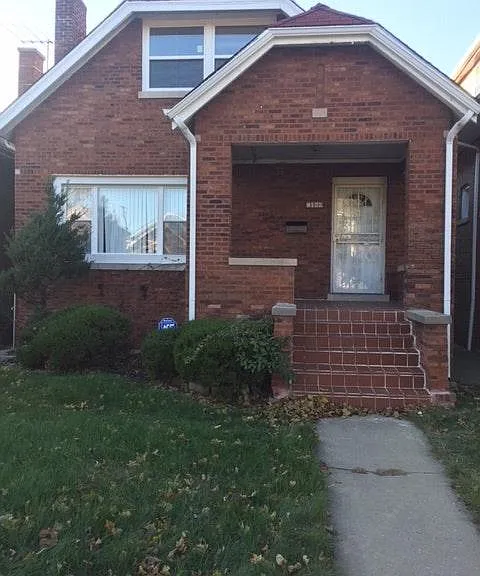 8122 S Rhodes Ave — Photo 1